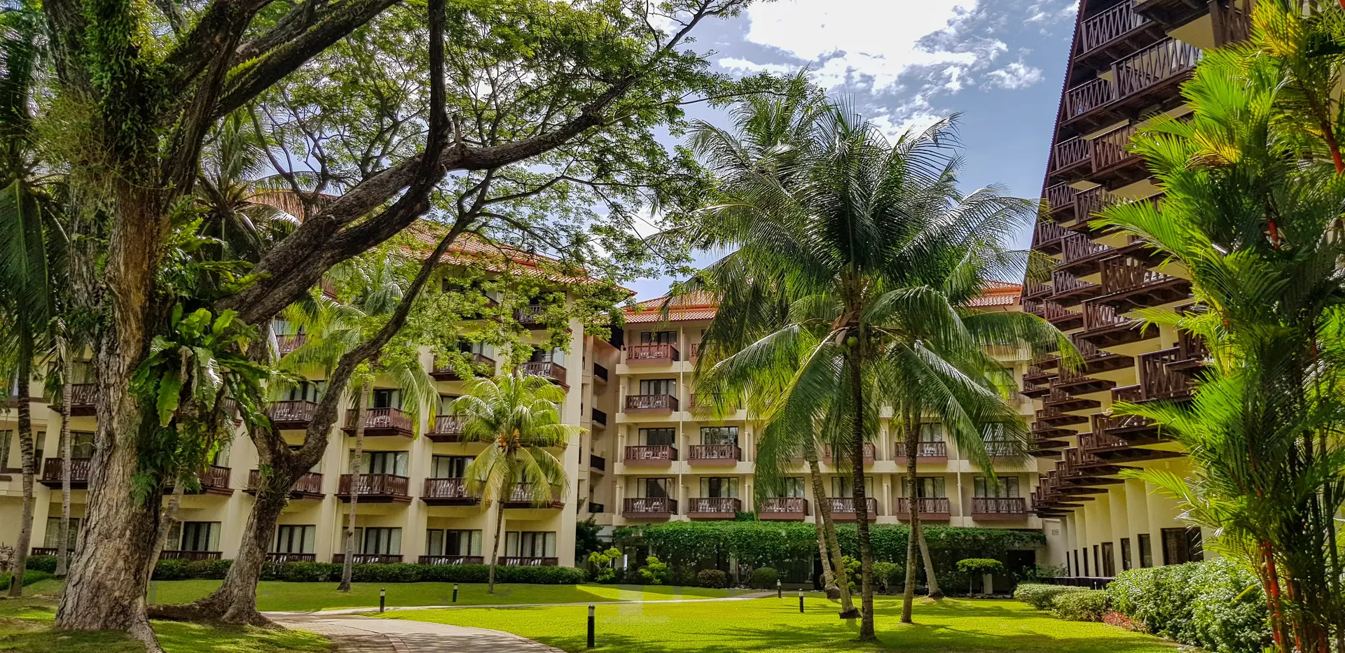 The Magellan Sutera Resort set among tropical gardens and palms